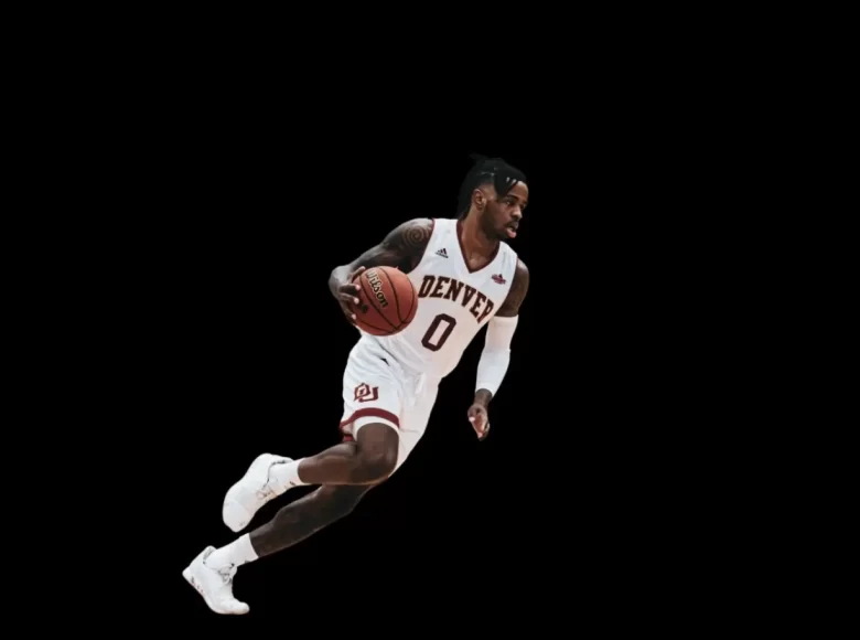 A basketball player running with a basketball