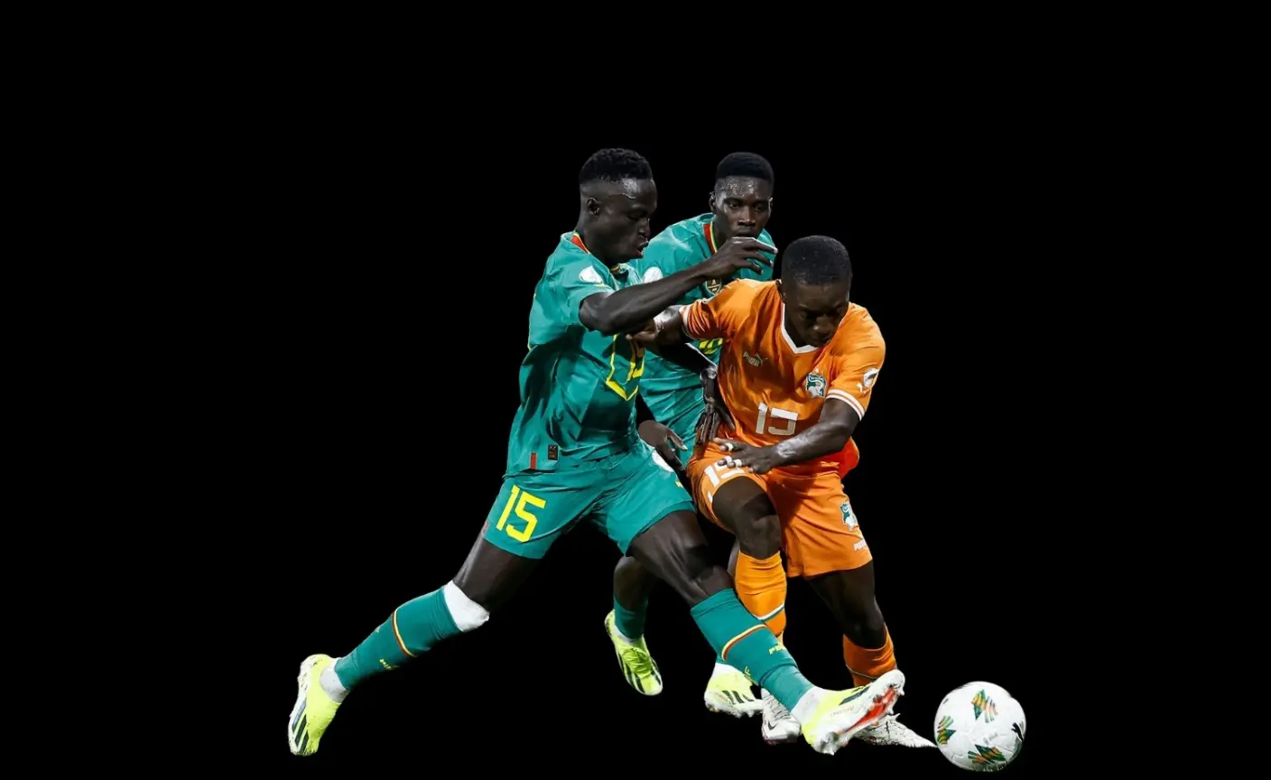 Players fighting for a ball in a football match